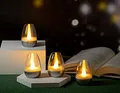 Northpoint LED Akku Lounge Lights 4er-Set mit Touchsensor Kabellos für Innen und Außen RGBW Flackereffekt mit Ladestation ca. 7 cm hoch (Silber Transparent)