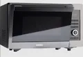 KOENIC KMWC 3019 DB, Mikrowelle (1000 Watt, Grillfunktion, Heißluftfunktion) NEU