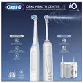 Oral-B Center OxyJet + iO4 Rotierende-vibrierende Zahnbürste für Erwachsene Weiß