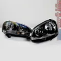 Hella Klarglas Scheinwerfer Set VW Golf 5 V GTI R32 schwarz inkl. Stellmotoren