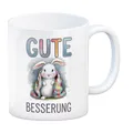 Gute Besserung Kaffeebecher - weißes Kaninchen in einer Decke