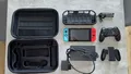 Nintendo Switch Konsole mit Joy-Con - Neon-Rot/Neon-Blau/Grau