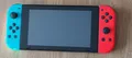 Nintendo Switch Konsole + USB Kabel + Joy-Con (Rot / Blau)