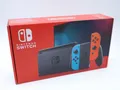 Nintendo Switch Konsole Schwarz mit 2 Joy Con Controller Neon Rot / Blau in OVP