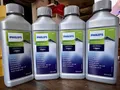 Spezieller Entkalker für Espressomaschinen PHILIPS  mit 4 Flaschen à 250 ml