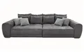 luma-home Big-Sofa 15114, XXL-Couch B306/T134/H86 cm, Liegefläche 120x240 cm, mit Federkernpolsterung, viele Kissen, markante Steppungen, Mikrofaserstoff Grau