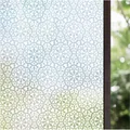Effektiver Sonnenschutz und Privatsphäre - Fensterfolie mit weißen Blumenmustern