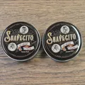 2 Dosen Suavecito Pomade auf Ölbasis je 85 ml. 100ml=21,76E :